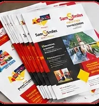 A stack of printed brochures